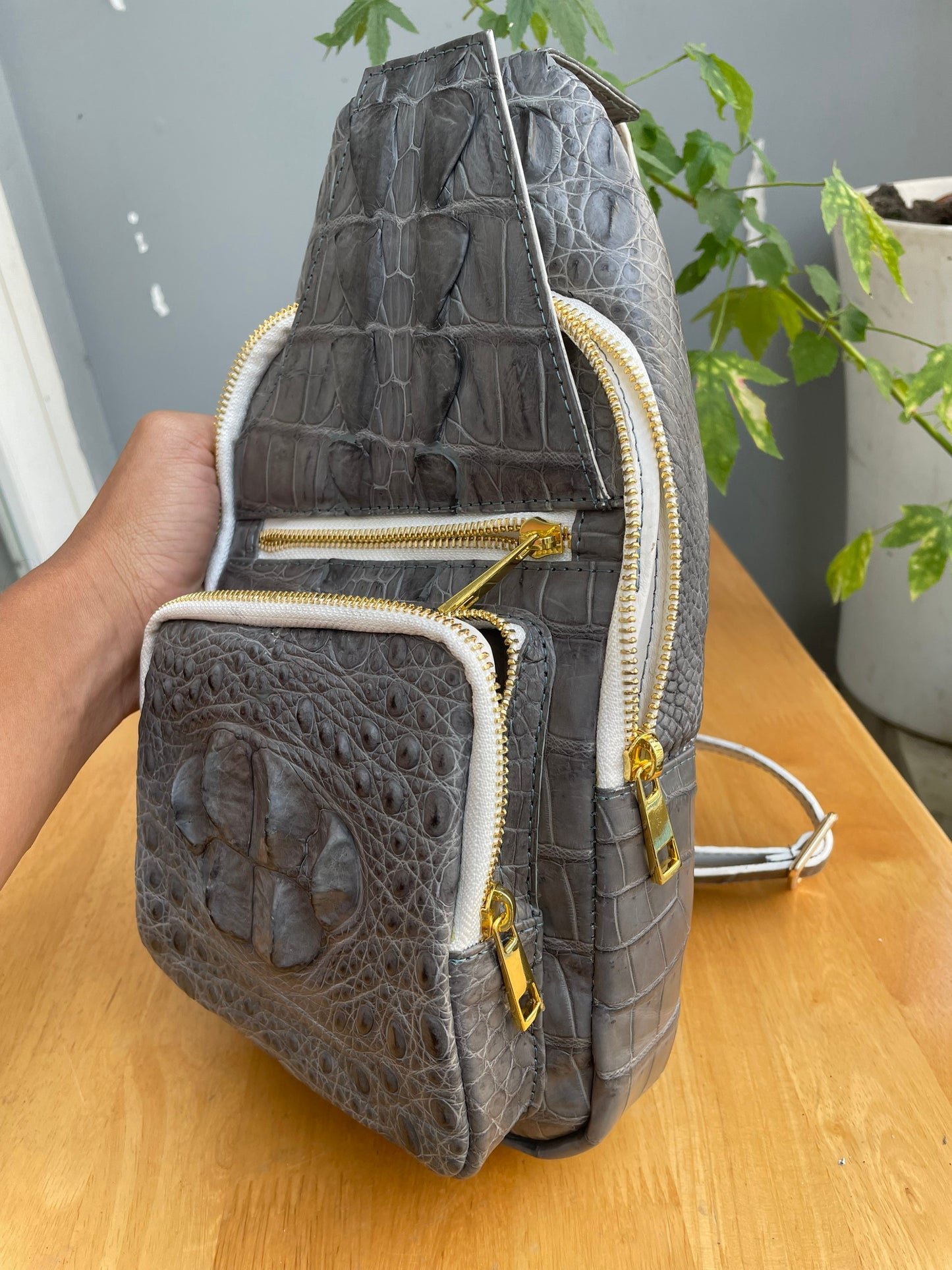 Gray alligator leather sling bag